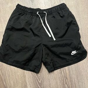 Nike Black Sports Shorts athletic woman’s mesh lining size medium almost new